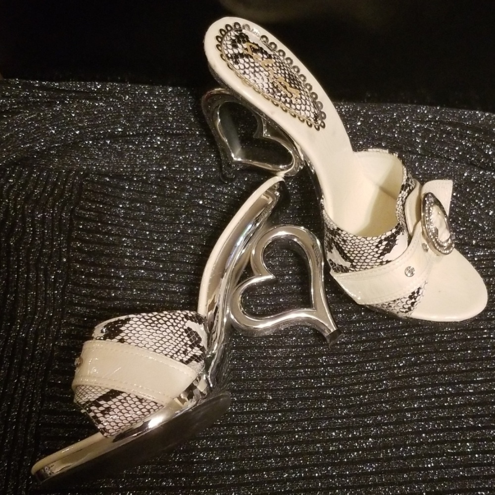 Faux snake skin look heart heel sandals.